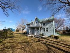 Expansive 7-Bedroom Country Home with Acreage