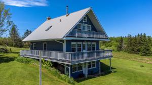Picture of Wheatley River, PEI - Charming 3-Storey, 3 Bedroom Home with Walkout Basement & Balcony