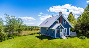 Picture of Wheatley River, PEI - Charming 3-Storey, 3 Bedroom Home with Walkout Basement & Balcony