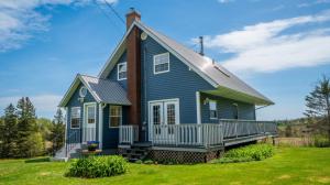 Wheatley River, PEI - Charming 3-Storey, 3 Bedroom Home with Walkout Basement & Balcony